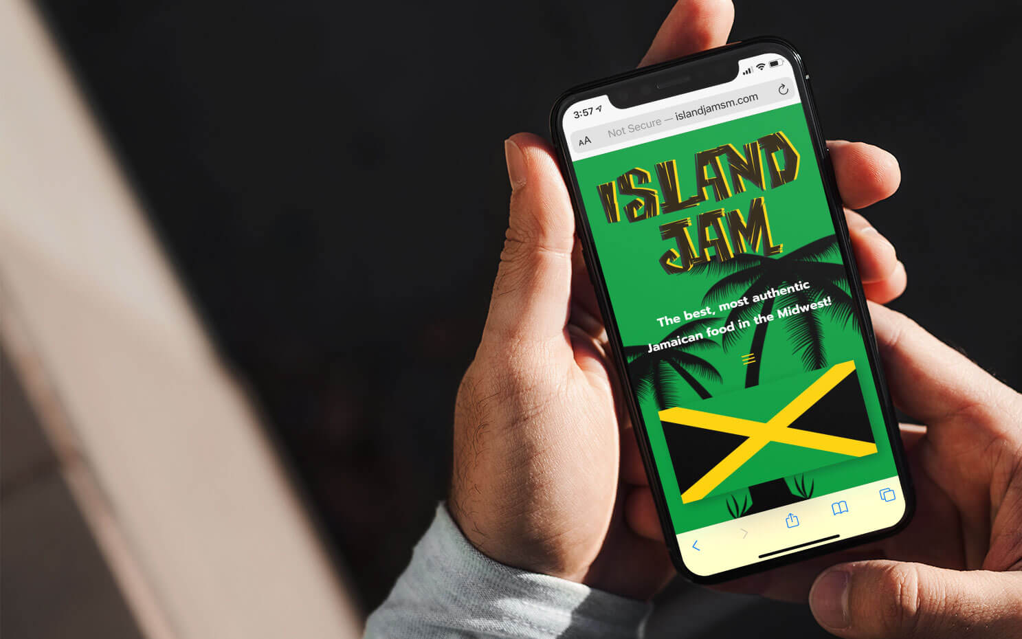 island-jam-mockup-of-a-man-holding-an-iphone-11-pro-with-both-hands-2127-el1