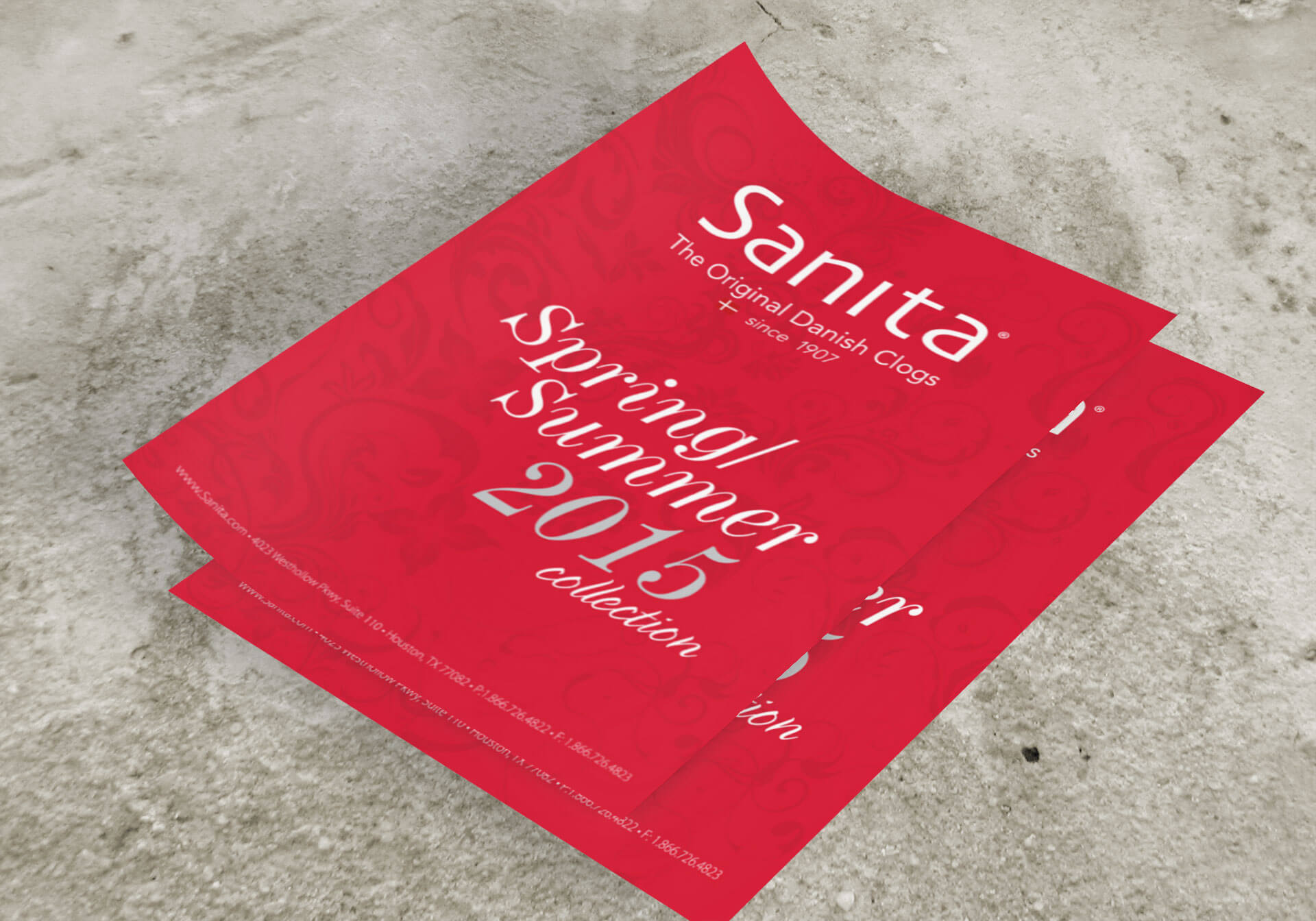 sanita_mockup-of-two-flyers-placed-over-a-concrete-surface-1293-el