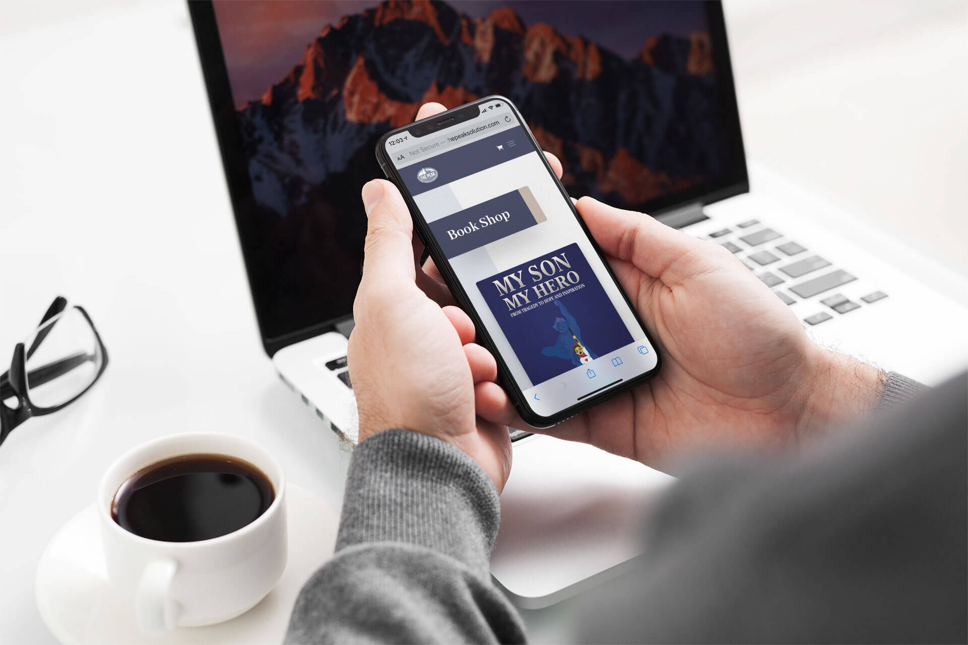 thepeak-mockup-of-a-man-using-his-iphone-11-pro-in-front-of-his-office-desk-2151-el1